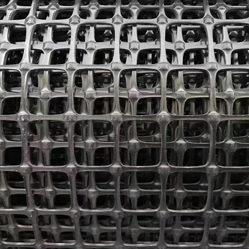 土壌強化のための二軸プラスチックジオグリッド,高張力PP/PETジオグリッド,Balck 30kN/m,道路ベース安定化網